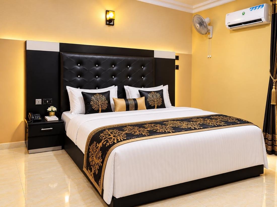 Royal Room bed with black and gold runner